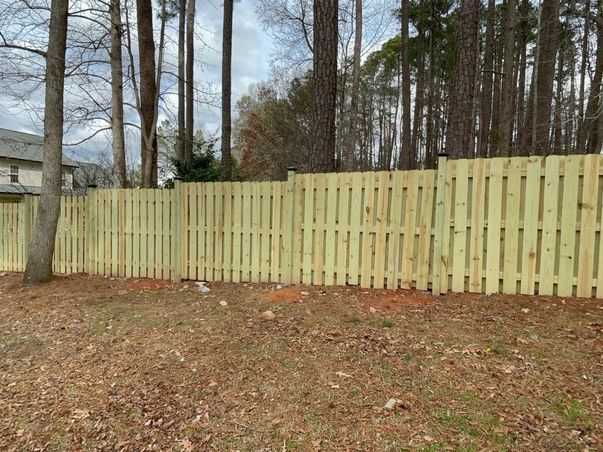 Step-wood-fence-installed-in-wendell