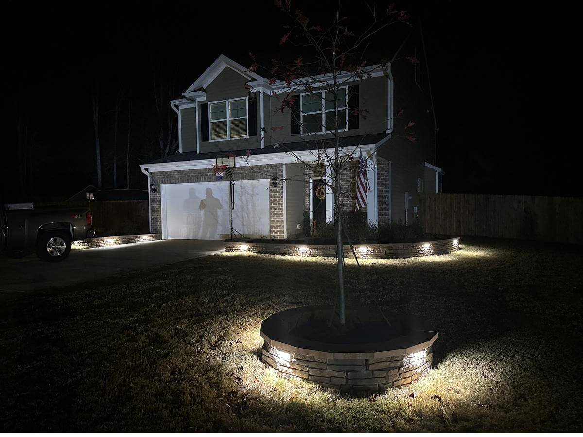 brown stone flower edging with soft lights in wendell