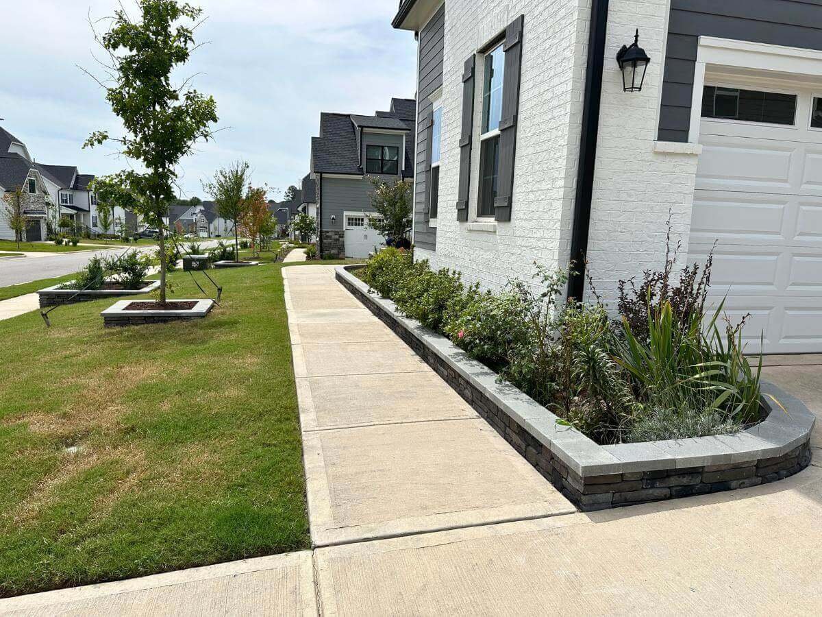 flower bed edging with gray stone installed in apex nc