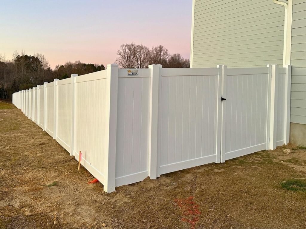 vinyl-privacy-fence-installed-in-angier-big-backyard